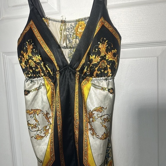 Chic Black and Gold Women's Mini Dress - Picture 2 of 3